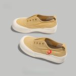 Beige Suede Slip-On Platform Sneakers with Vibrant Tiger Patch